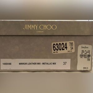 size 7. Practically brand new, worn only once. Metallic mix gold and silver